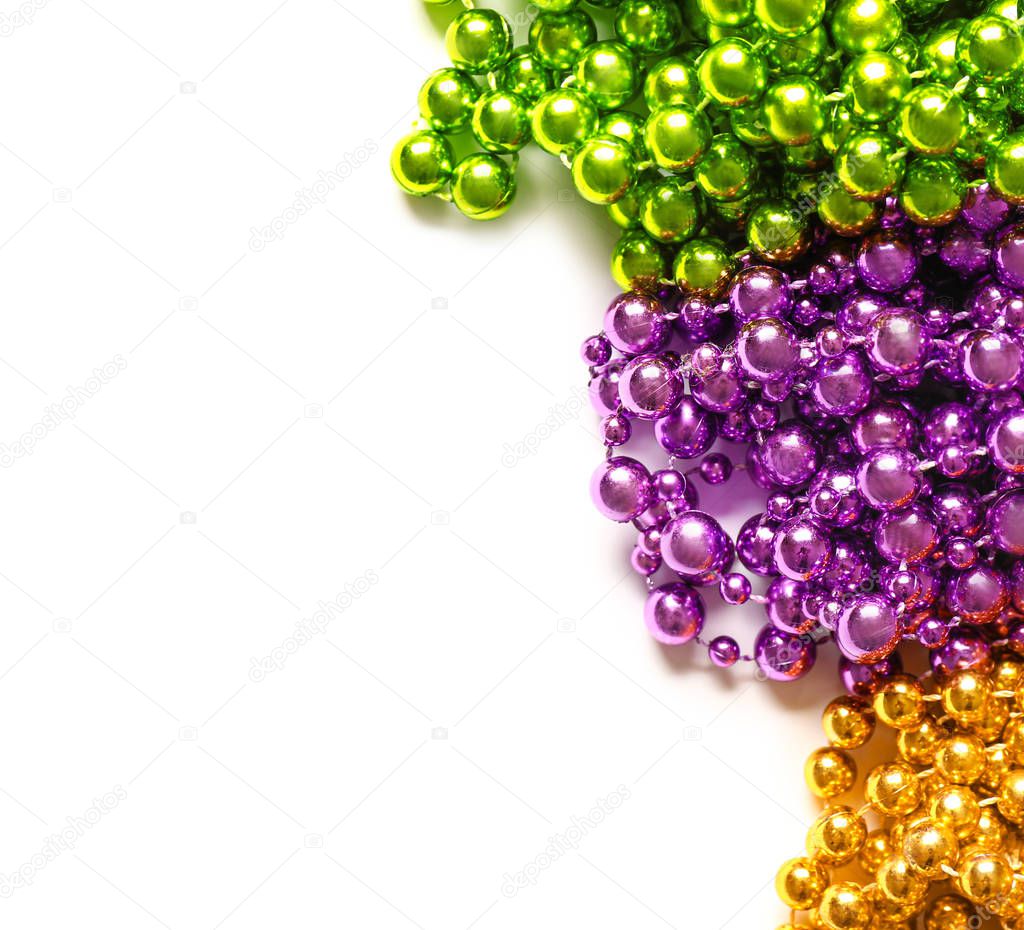 Colorful beads on white background