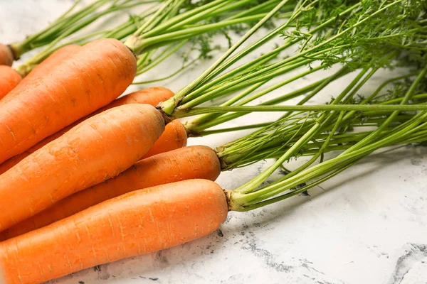 Fresh carrots on light background — Stock Photo, Image