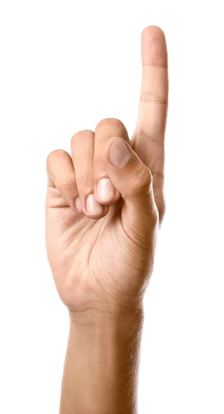 흰색 배경에 제기 된 검지 손가락을 가진 남성 손 — 스톡 사진