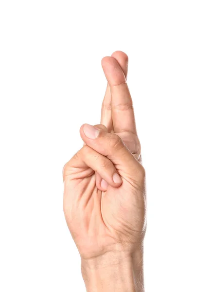 Αρσενική χέρι με δάχτυλα σταυρωμένα σε λευκό φόντο — Φωτογραφία Αρχείου