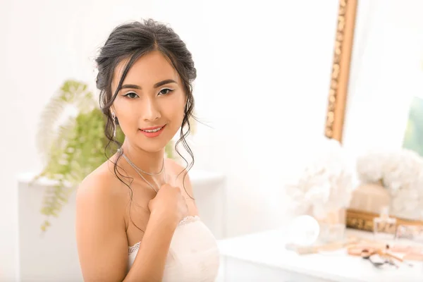 Beautiful young Asian bride at home — Stock Photo, Image