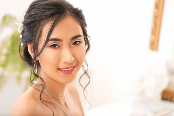 Beautiful young Asian bride at home — Stock Photo, Image