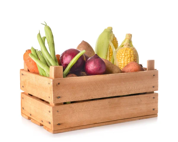 Many healthy vegetables in box on white background — Stock Photo, Image