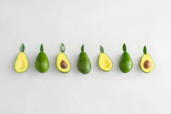 Fresh ripe avocados on white background — Stock Photo, Image