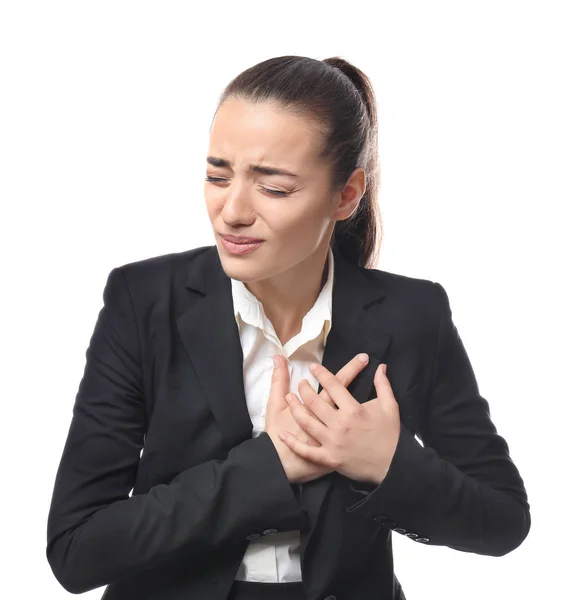 Junge Geschäftsfrau erleidet Herzinfarkt auf weißem Hintergrund — Stockfoto