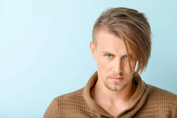 Portrait of young man on color background — Stock Photo, Image