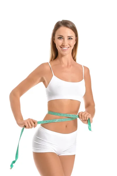 Mooie jonge vrouw met meetlint op witte achtergrond. Gewichtsverlies concept — Stockfoto