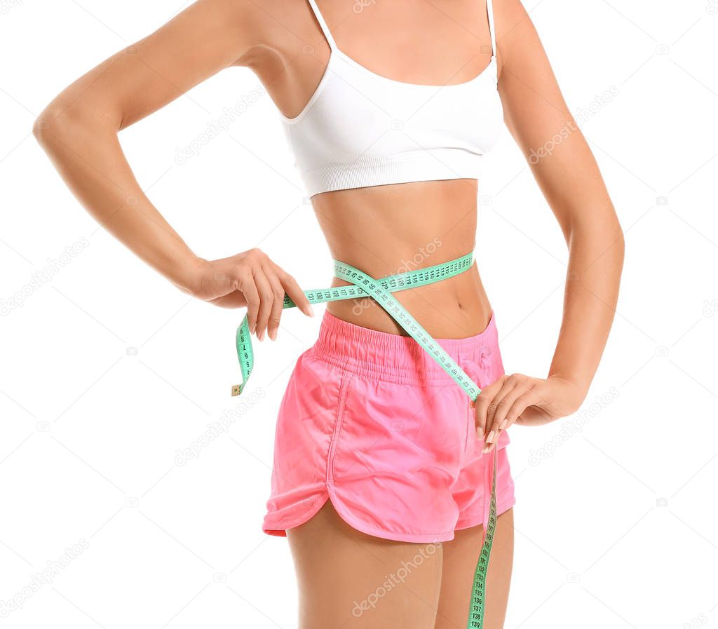 Beautiful young woman with measuring tape on white background. Weight loss concept