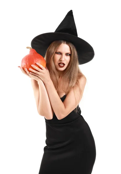 Krásná žena oblečená jako čarodějnice na Halloween na bílém pozadí — Stock fotografie