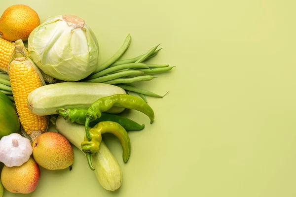 Many healthy vegetables on color background