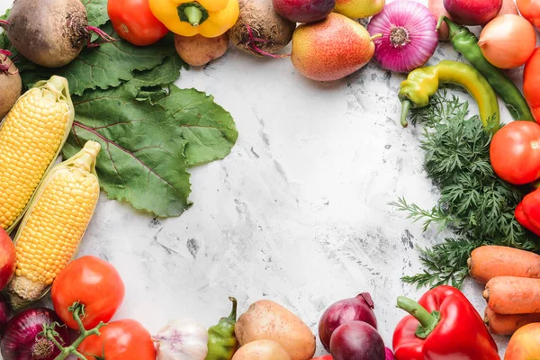 Frame made of healthy vegetables and fruits on white background — Stock Photo, Image