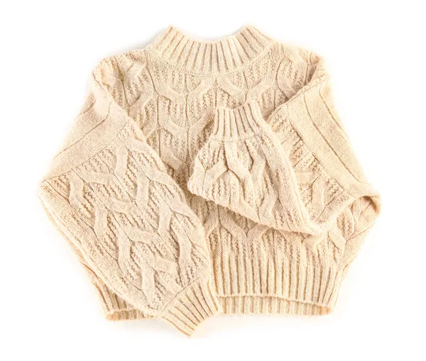 Beyaz arka planda örülmüş süveter