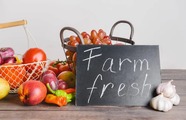 Many healthy vegetables and fruits for farmers' market on wooden table — Stock Photo, Image