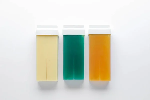 Liposoluble wax cartridges on white background — Stock Photo, Image