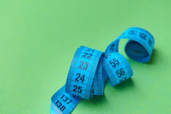 Measuring tape on color background — Stock Photo, Image