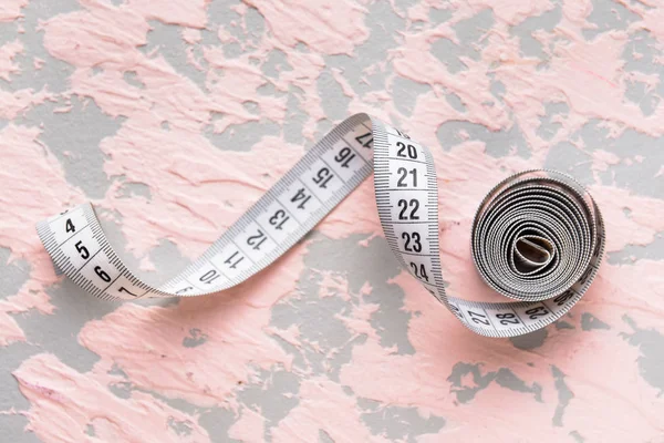 Measuring tape on color background — Stock Photo, Image