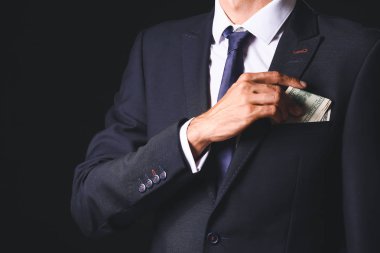 İş adamı karanlık geçmişine karşı rüşvet veriyor. Yozlaşma kavramı