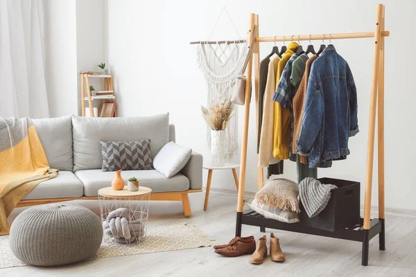 Interior of room with clothes rack — Stock Photo, Image