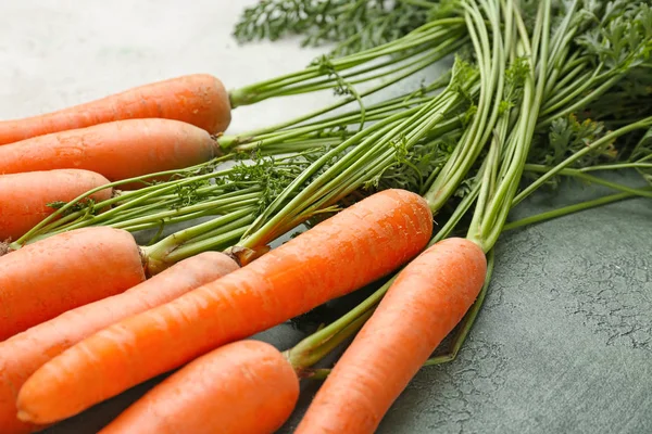 Bunch of fresh carrot on table — Stock Photo, Image