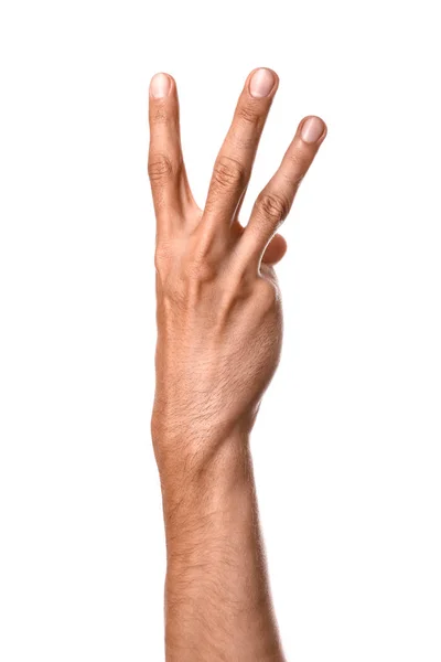 Mão masculina mostrando três dedos no fundo branco — Fotografia de Stock