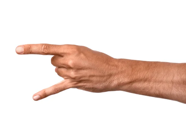 Manlig hand visar ”djävulshorn” gest på vit bakgrund — Stockfoto