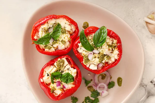 Plate with tasty stuffed pepper on table — Stock Photo, Image