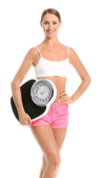 Beautiful young woman with scales on white background. Weight loss concept — Stock Photo, Image