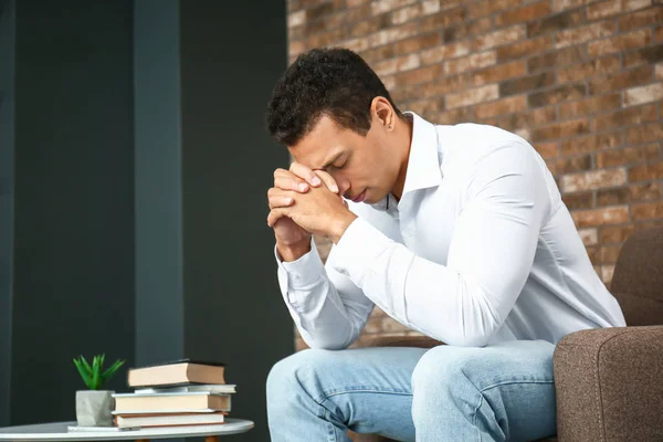 Depressed African-American man at home — Stock Photo, Image