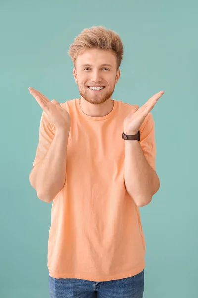 Portrait of happy man on color background — Stock Photo, Image