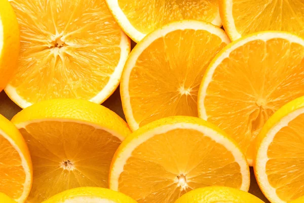 Ripe orange slices as background — Stock Photo, Image