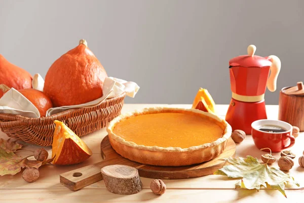 Tasty pumpkin pie on wooden table — Stock Photo, Image