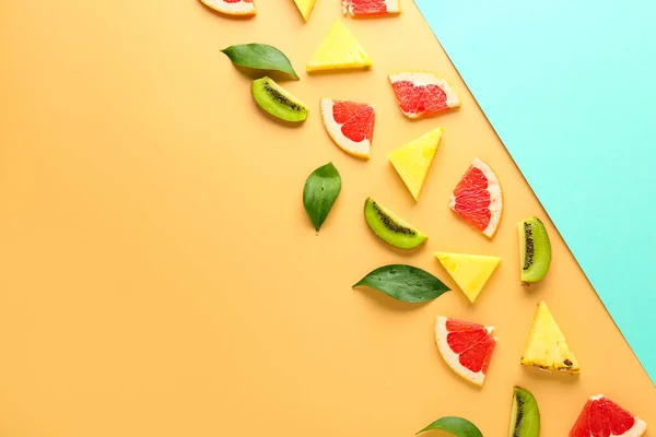 Sweet ripe fruits on color background — Stock Photo, Image