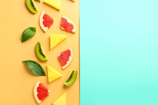 Sweet ripe fruits on color background — Stock Photo, Image