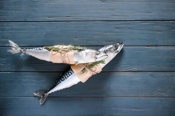Fresh mackerel fish on wooden table — Stock Photo, Image