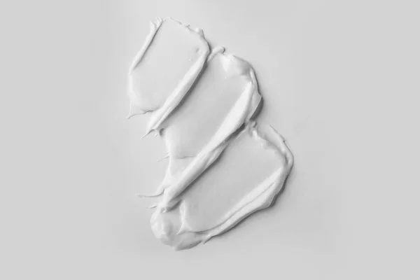 Sample of cream on white background — Stock Photo, Image