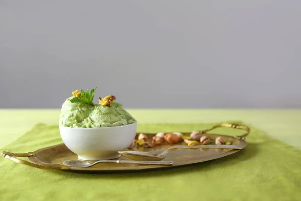 Tray with tasty pistachio ice cream on table — Stock Photo, Image