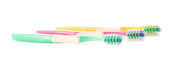 Escovas de dentes no fundo branco — Fotografia de Stock