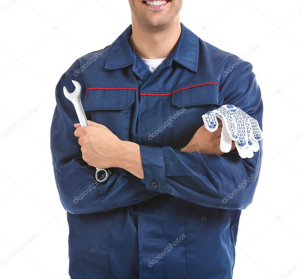 Male car mechanic on white background