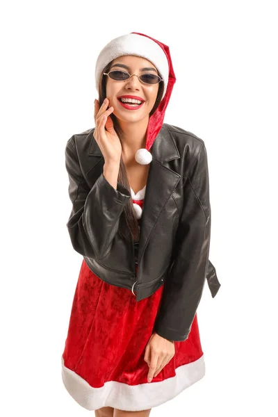 Cool jonge vrouw in Santa Claus kostuum en lederen jas op witte achtergrond — Stockfoto