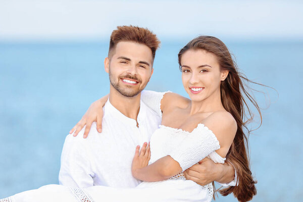 Happy couple at sea resort