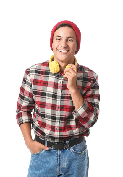 Portrait of handsome young man with headphones on white background — Stock Photo, Image