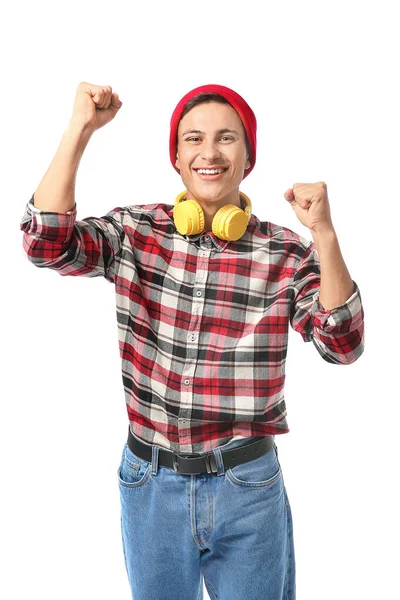Portret van een gelukkige jongeman met een koptelefoon op een witte achtergrond — Stockfoto