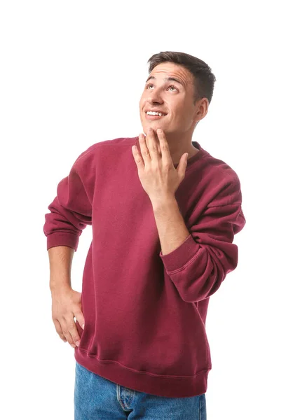 Retrato de un joven apuesto y reflexivo sobre fondo blanco —  Fotos de Stock