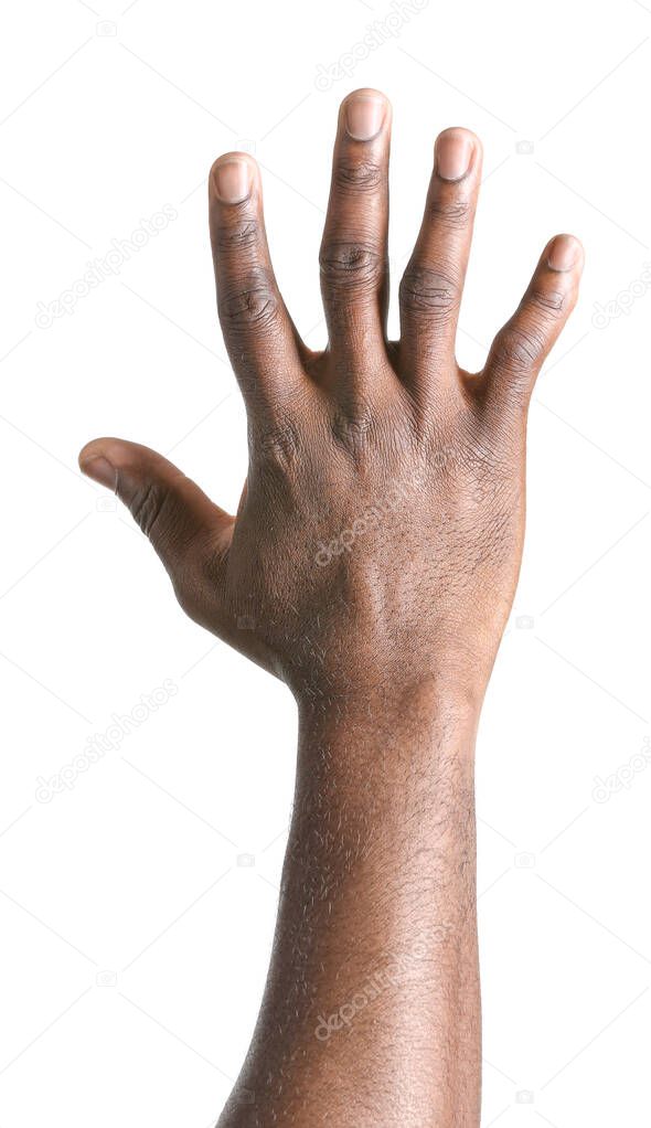 Hand of African-American man on white background