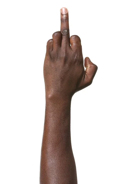 Mano del hombre afroamericano mostrando el dedo medio sobre fondo blanco — Foto de Stock