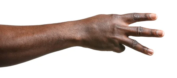 Hand of African-American man showing three fingers on white background — ストック写真