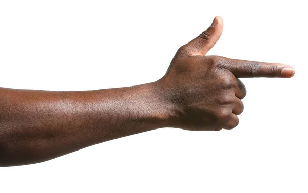 Hand of African-American man pointing at something on white background — Stock Photo, Image