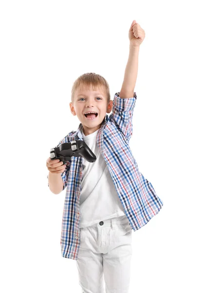 快乐的小男孩在白色背景下玩电子游戏 — 图库照片