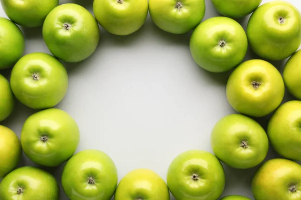 Frame made of fresh ripe apples on light background — Stock Photo, Image