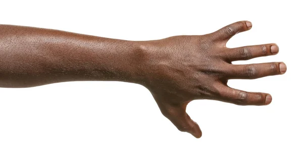 Hand of African-American man holding something on white background — Stock Photo, Image